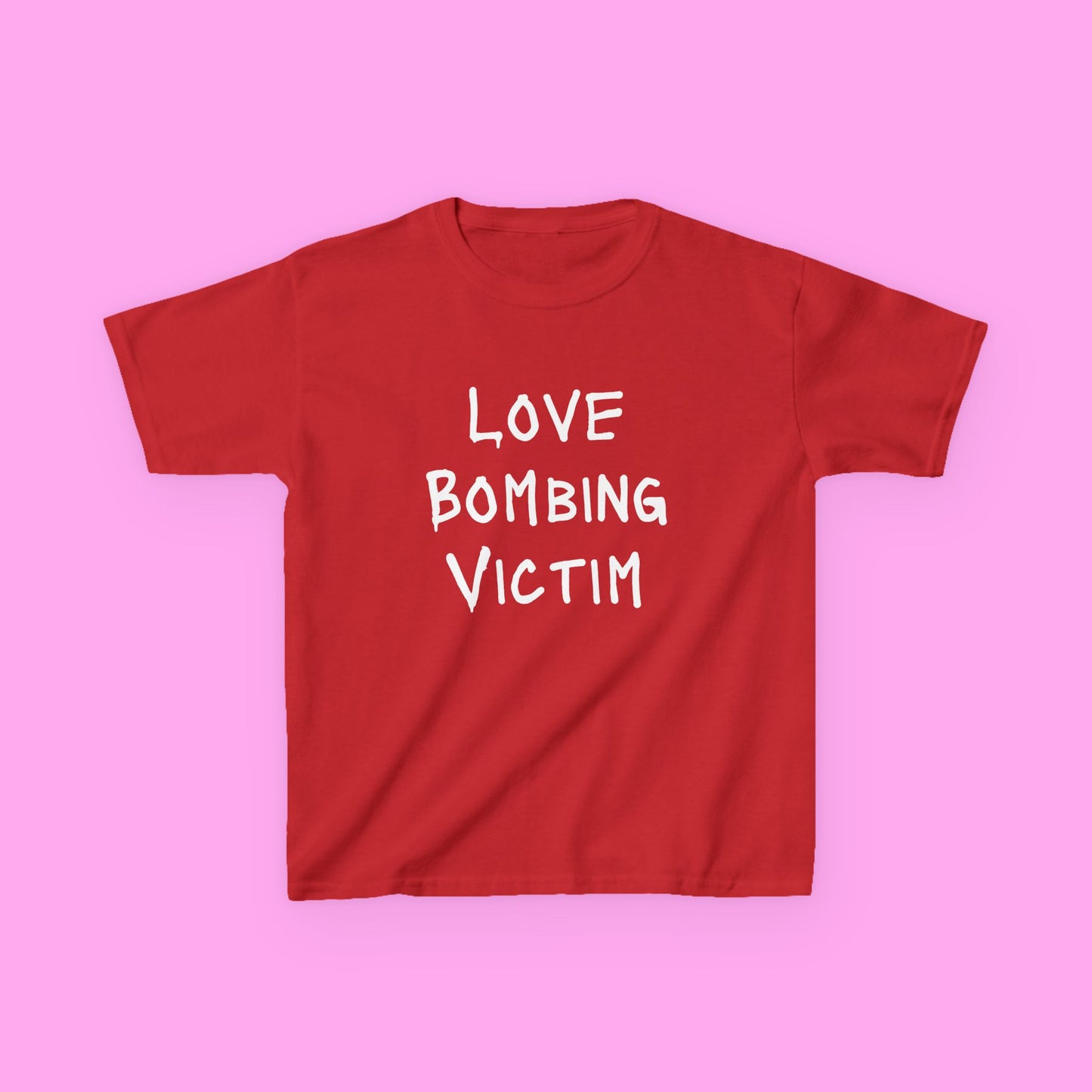 Love bombing victim baby tee