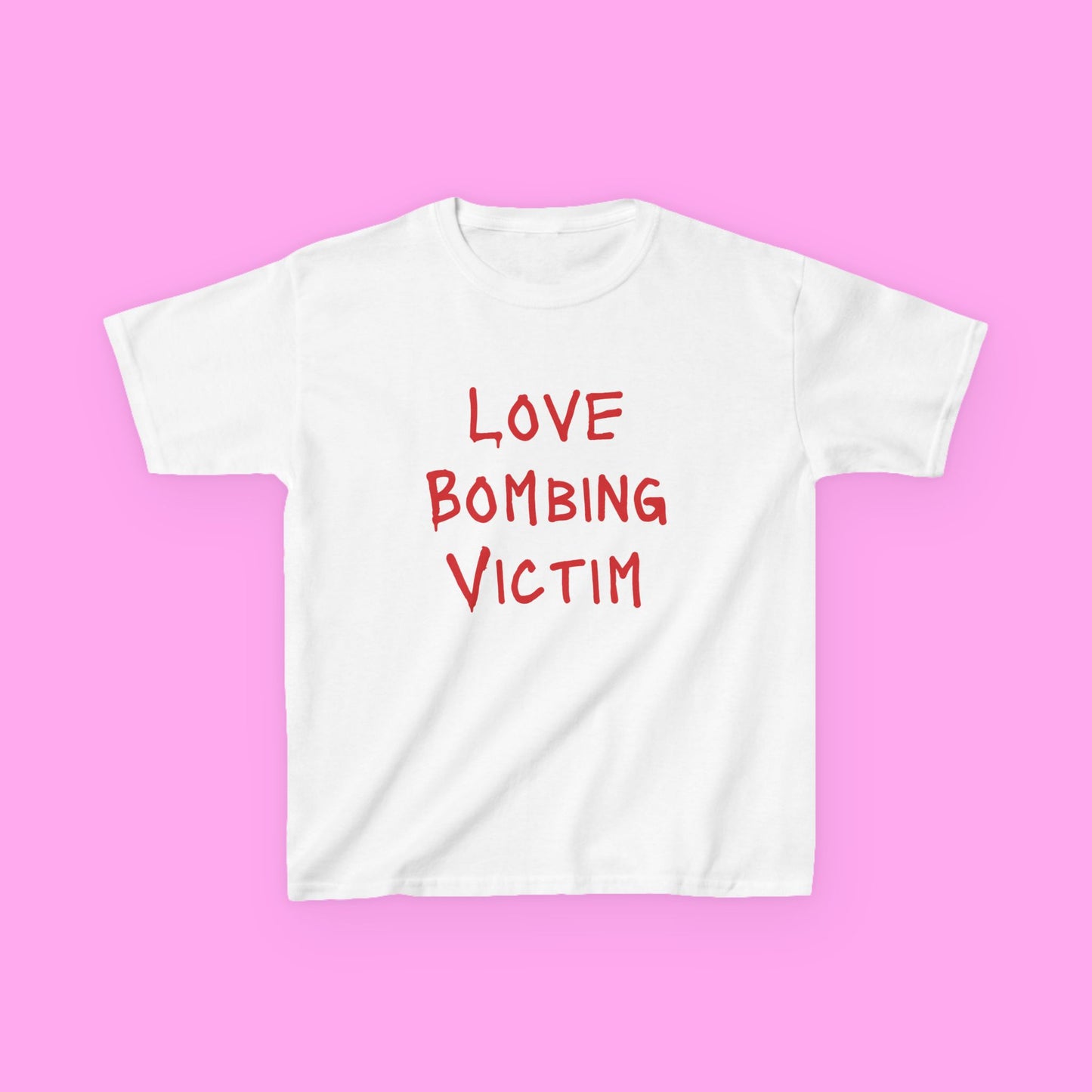 Love bombing victim baby tee