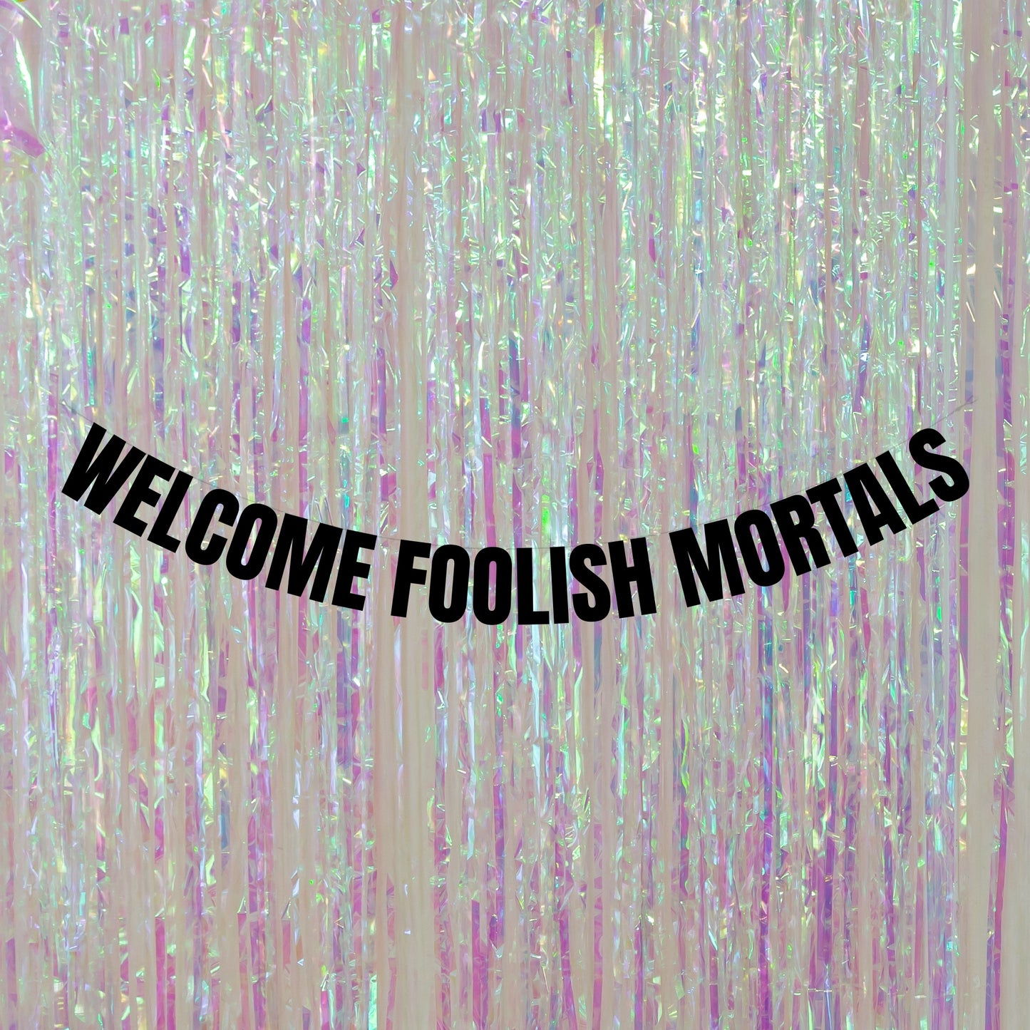 Welcome foolish mortals banner
